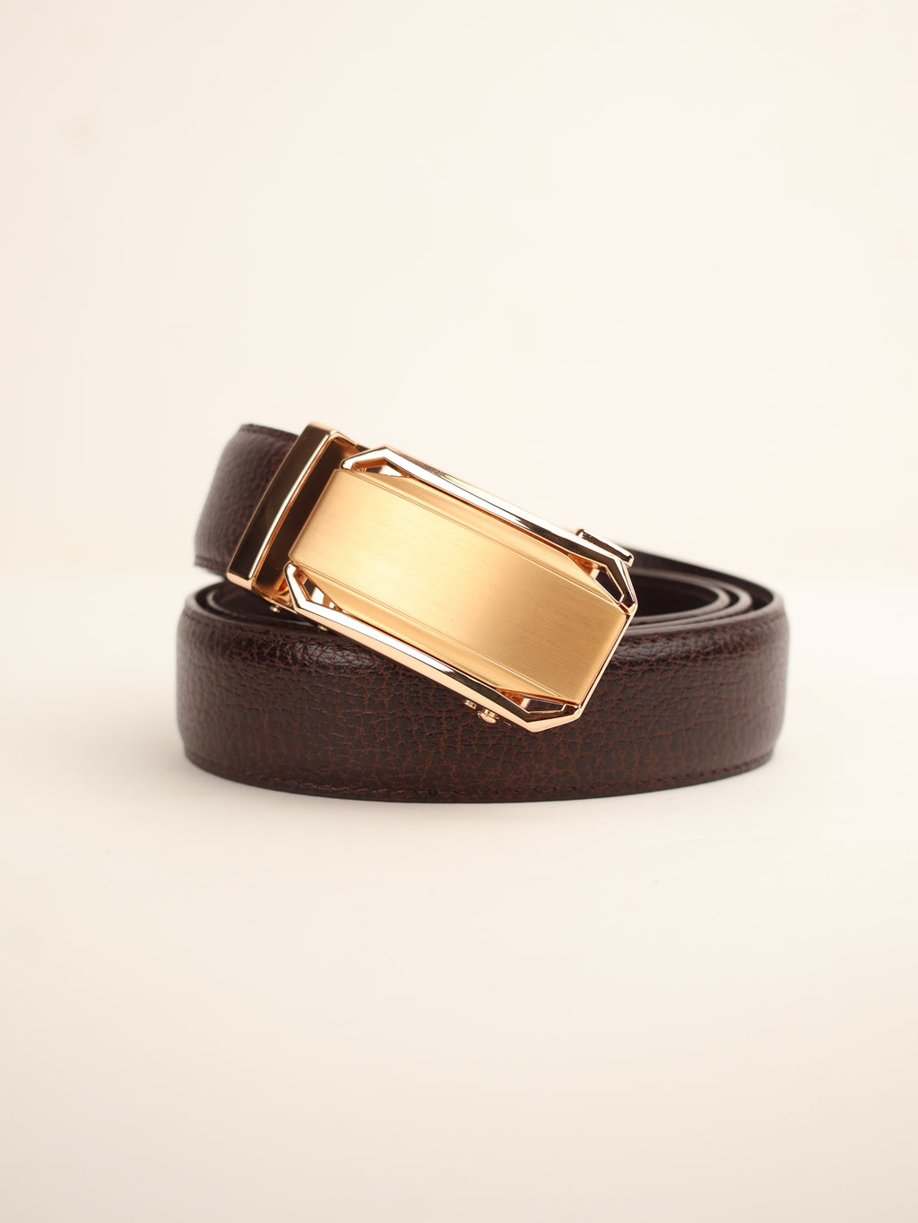 Brown leather belt with a gold buckle 