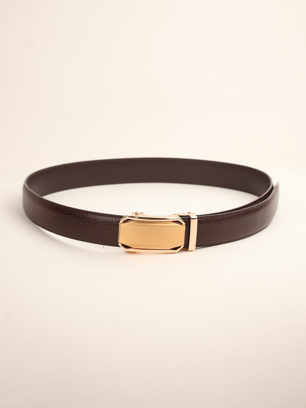 Brown belt with gold buckle