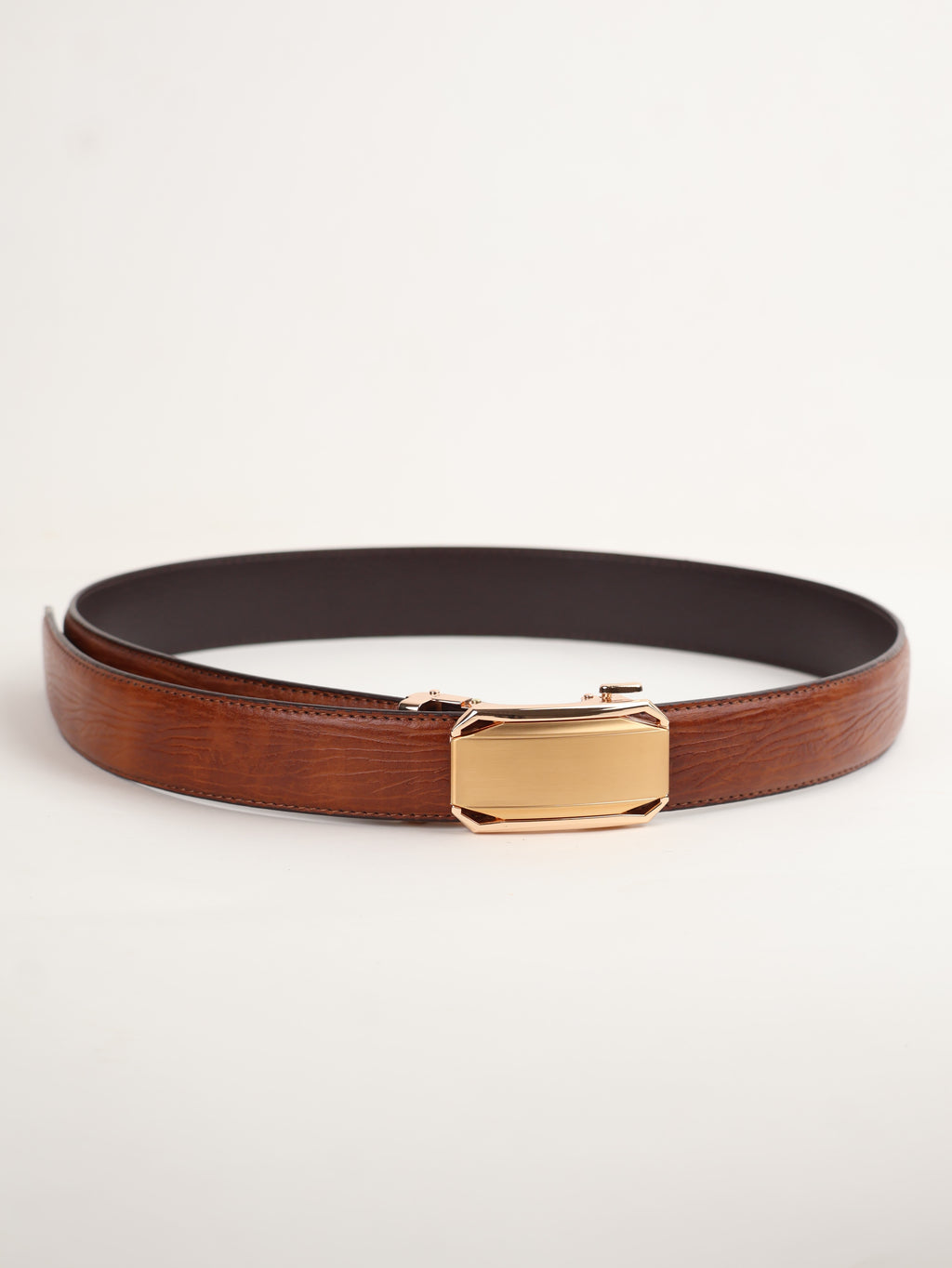 Tan belt with a gold buckle 